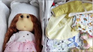 Упаковка куколки с большим комплектом одежды