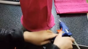 Кукла из конфет и гофрированной бумаги (сделать своими руками)