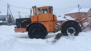 К-700А/701 чистит снег