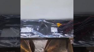 Камера в номерной рамке