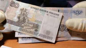 ? Корешок 5000 рублей.Перебор банкнот из банка под конец года.