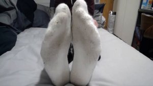 18 year old male feet in sweaty white Nike crew socks