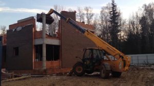 Погрузчик с телескопической стрелой