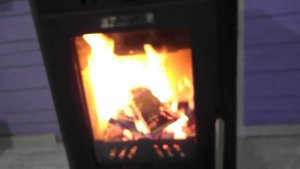 печь-камин Брандербург. Отопление дома из бруса . Дверка со стеклом