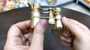 Театральный бинокль с цепочкой 103*53*35 мм.