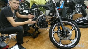 Как поднять переднее колесо мотоцикла