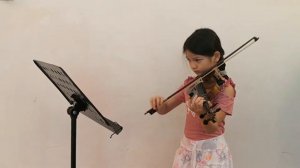 9-year-old playing "Gipsy Dance - Fiddle Time Runners" on a violin.