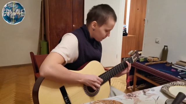 Квартирник в канун Рождества. Катерина Полякова с гитарой.