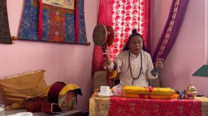 Lama Norbu Rinzin is playing  Chöd damaru drum and kangling, thigh-bone trumpet