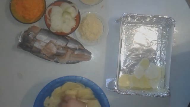 Рыба запеченная с овощами и сыром
