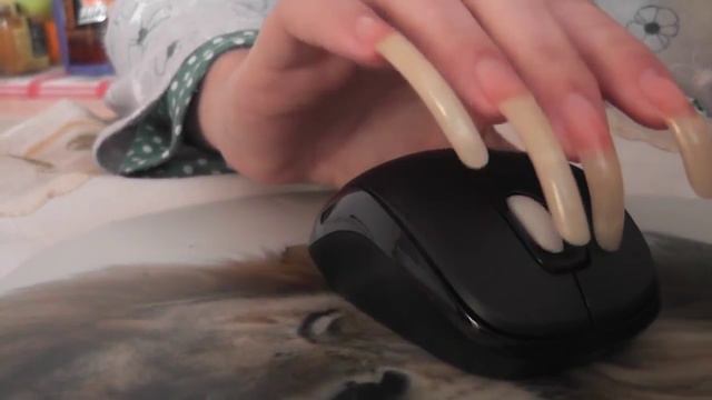 Black-Kitty using computer and mouse with very long nails video 50