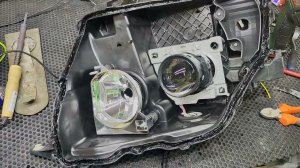 Установка bi-led линз Aozoom 5 поколения Mitsubishi pajero 4 рестайлинг, Араб.