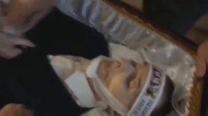 Прощание у гроба матери с сыном:  Парализованным иконописецем Сергием