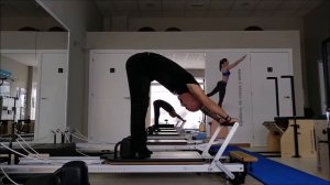 stretching. Studio Pilates Lugo. Reformer class