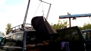 Поднятие лодки на экспедиционный багажник