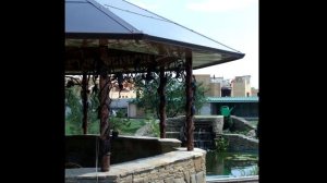 Красивая беседка из металла и камня для дачи, для сада, для частного дома на участке