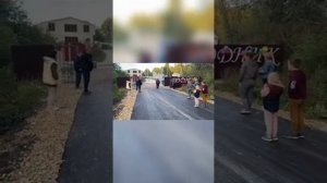 Асфальтирование спуска к центральным воротам