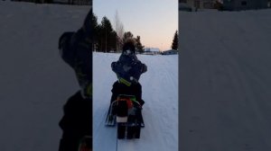 Детский снегокат с мотором.