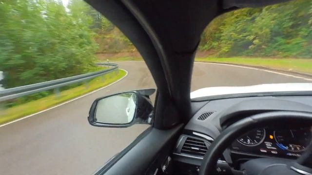 BMW M140i drifting the black forest