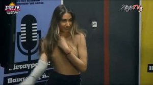 The strip show of Elena Kremlidou on Sport FM Studio.