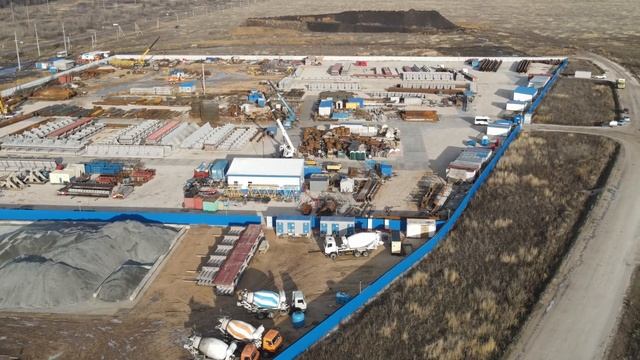 Путепровод у моста, бетонный завод и склад. Строительство моста через Волгу Тольятти смотреть онлайн