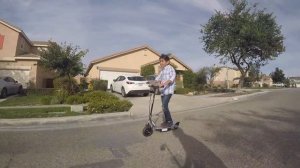 Sayid trying out his Razor Electric scooter 125