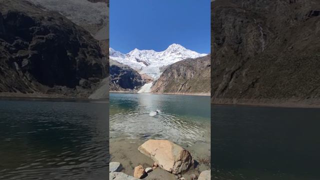 Swimming in Laguna Rajucolta, Huarez Peru. Glacier water.