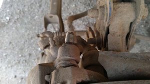 Мазда 626ge, снимаем суппорт задний