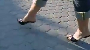 walking in high heel mules