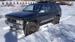 Classic Nissan WD21 Pathfinder / Terrano off-road after ice storm