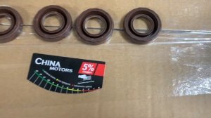 Сальник свечного колодца Geely MK Cross, E010410005