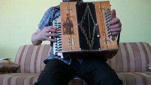 Кустарная гармонь ля-диез трехголосая