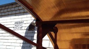 Садовые качели из профильной трубы с коваными элементами