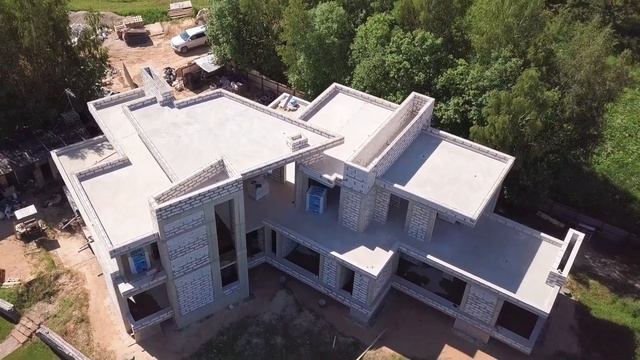 GORODENKA. Строительство современного монолитного дома с плоской крышей.
