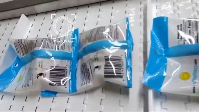 Фасовка жевательного мармелада по 99 грамм на 10 поточном дозаторе и вертикальной упаковочной машин смотреть онлайн