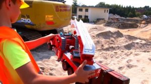 Excavator finds a Chest full of Toy Vehicles for Kids
