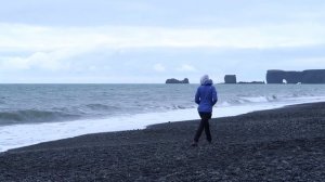 Iceland - Black beach in Vík, Dyrhólaey peninsula, turf houses