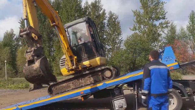 Перевозка экскаватора на эвакуаторе