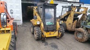 Погрузчик UNC 060 работа цилиндров выравнивания ковша.