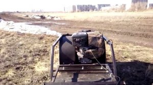 Мотобуксировщик по грязи