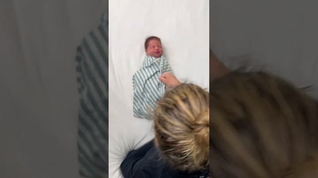 The Down Up, Down Up (DUDU) Swaddle Technique with a newborn baby