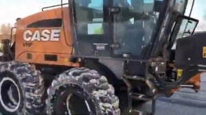 Работа полноприводного тяжелого автогрейдера Case 885B на севере