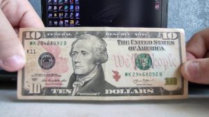 Реальная цена банкноты 10 долларов США 2013 года.