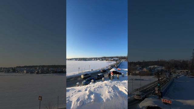 Церковь в Карелии с видом на Онежское озеро и город Петрозаводск