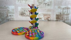 Marble run race ASMR wooden sounding tree and Pop It