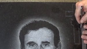 Гравировка надписей ,изображений и резьба на гранитном памятнике.