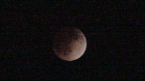Pictures and partial time-lapse video of Lunar Eclipse using Sony HDR-CX12 (poor man's telescope)