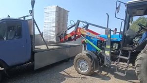 Погрузчик Азас ПКУ-0.9 поднимает больше 1т. без нагрузки