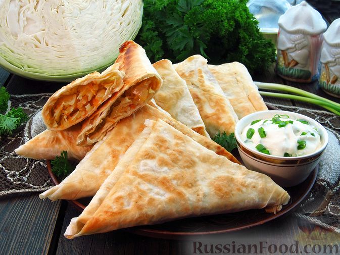 Ленивые и сочные.
ПИРОЖКИ ИЗ ЛАВАША С КАПУСТОЙ
