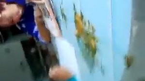 Бабушка делает с внуком уроки